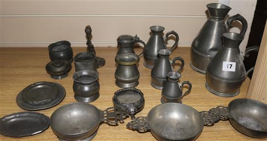 A graduated set of pewter measures, three quaich, miniatures plates, etc.